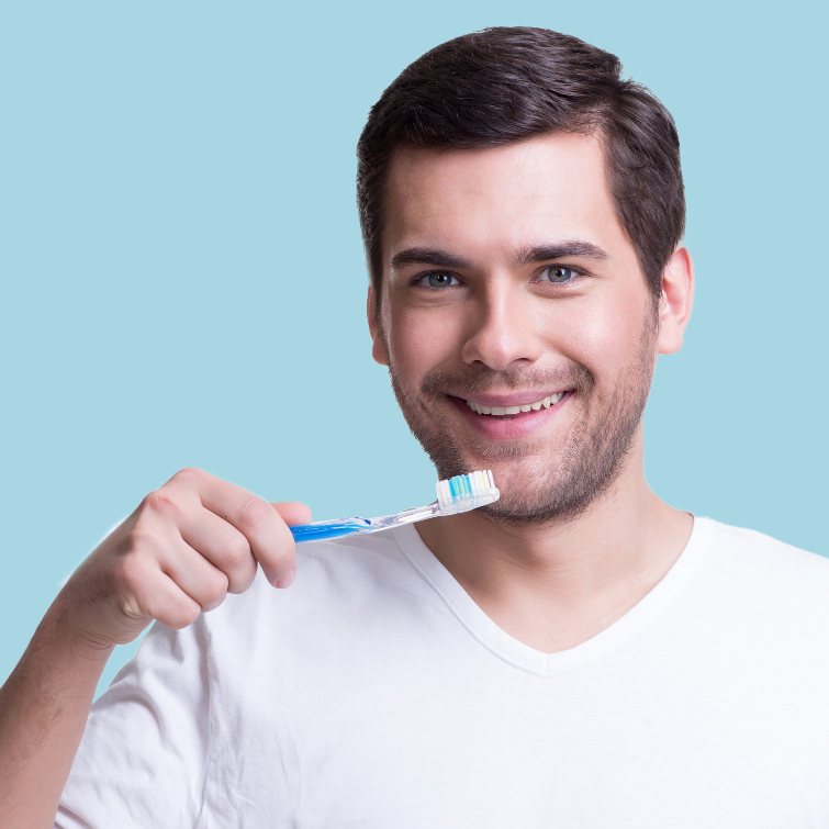 portrait-smiling-young-man-with-toothbrush-white-t-shirt.jpg